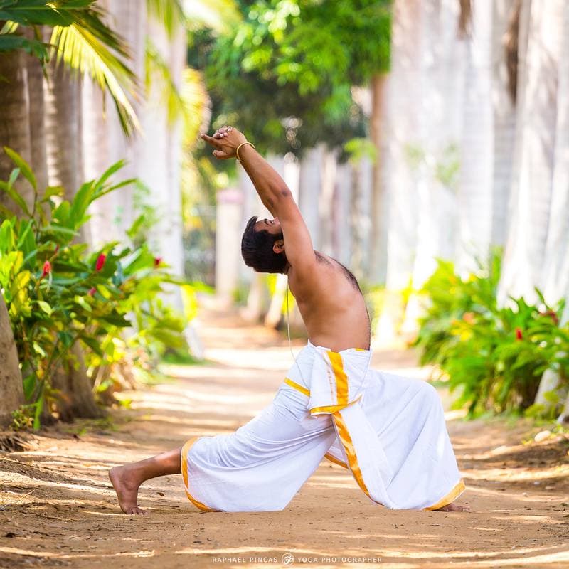 Aravind Prasad — Crescent Lunge in Traditional Dhoti, Mysore