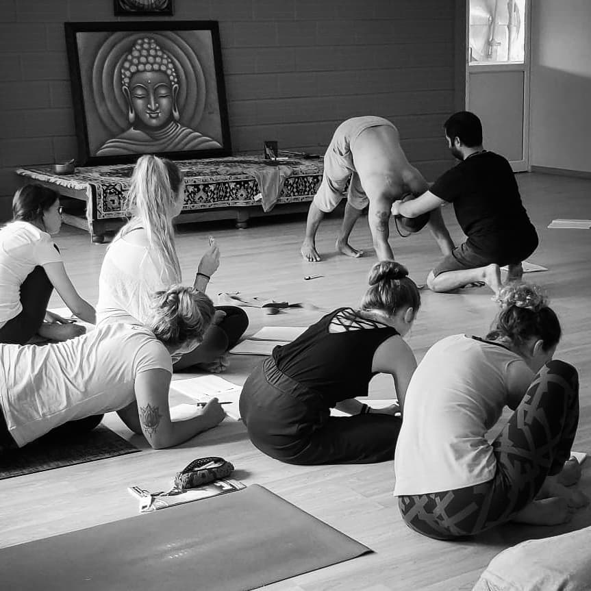Aravind Prasad Crow Pose Demo — Students Taking Notes, Mysore