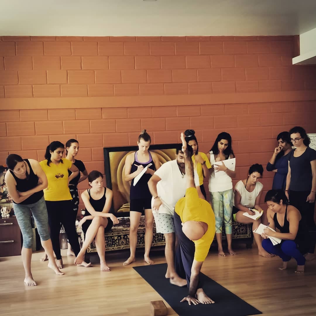 Aravind Prasad Teaching Forward Bend — Students Observing, Mysore