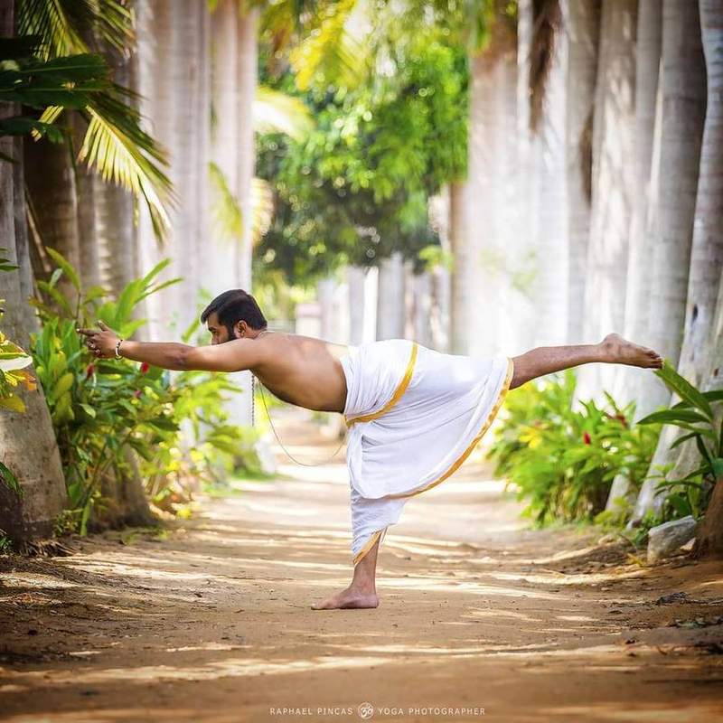 Aravind Prasad — Virabhadrasana III in Traditional Dhoti, Mysore